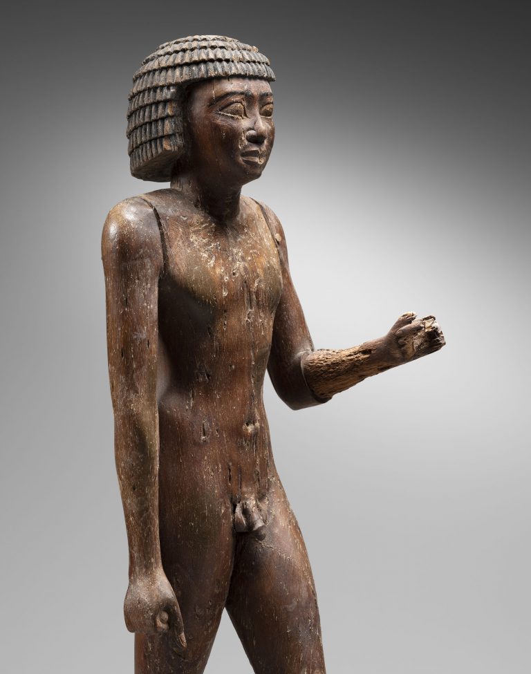 large egyptian figure of a man walking