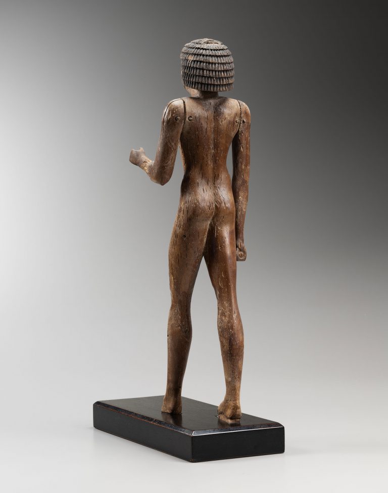 large egyptian figure of a man back