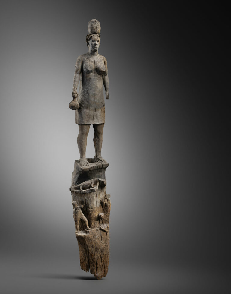 Commemorative Post of a Female Villager carved by Fesira Madagascar, Southeast region