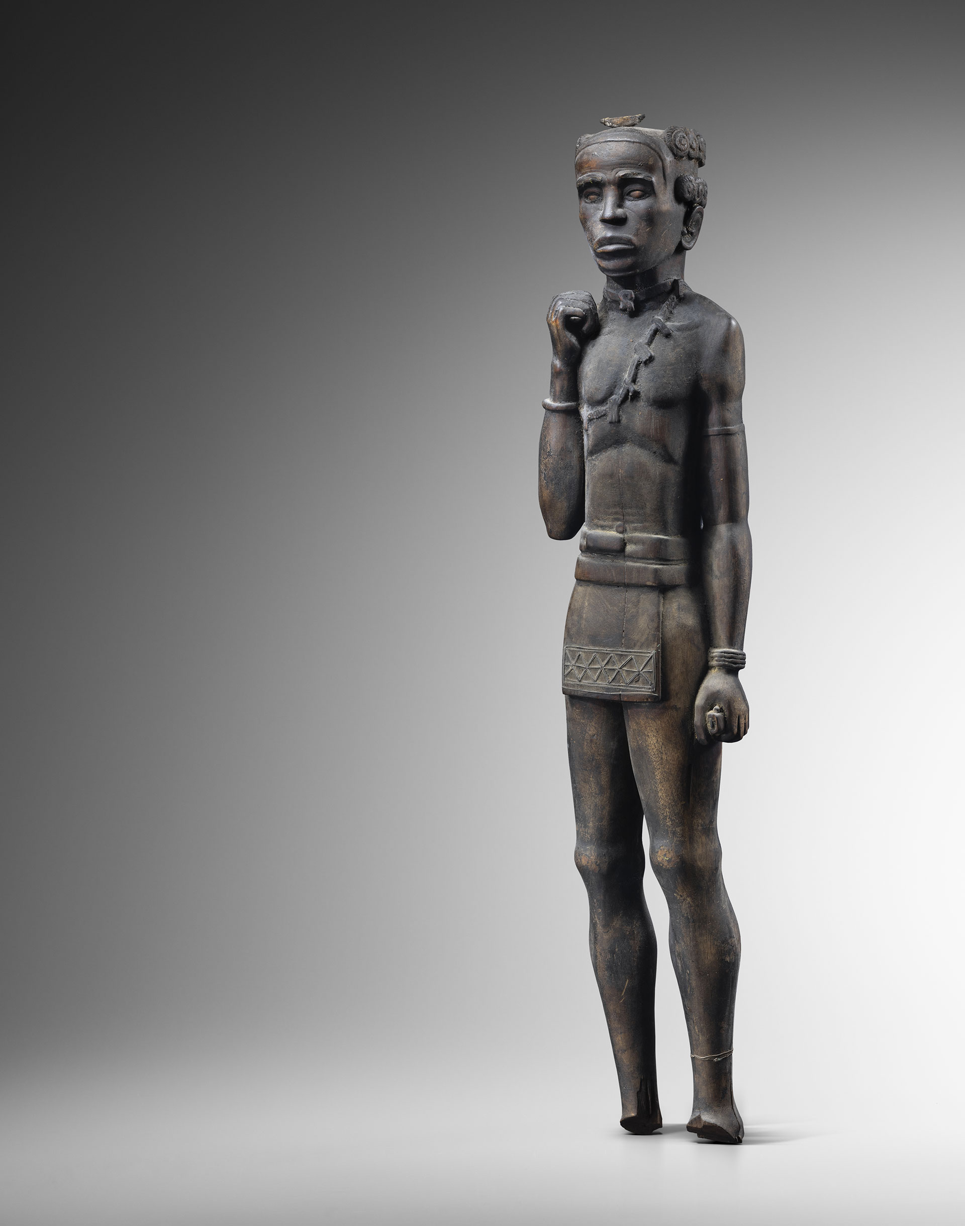 Large Figure of a Hunter with a Mohara Madagascar, Southern region