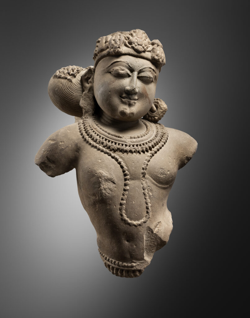 BUST OF A MAN WITH A LOVELY HAIRSTYLE