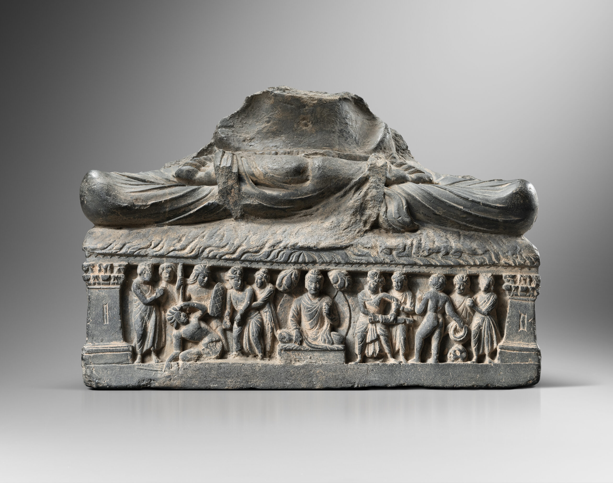 LOWER BASE OF A FASTING BUDDHA