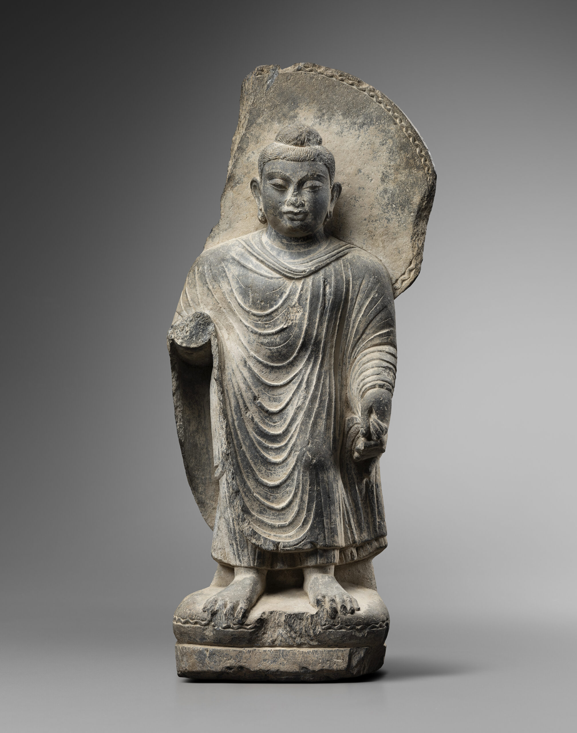 FIGURE OF A STANDING BUDDHA