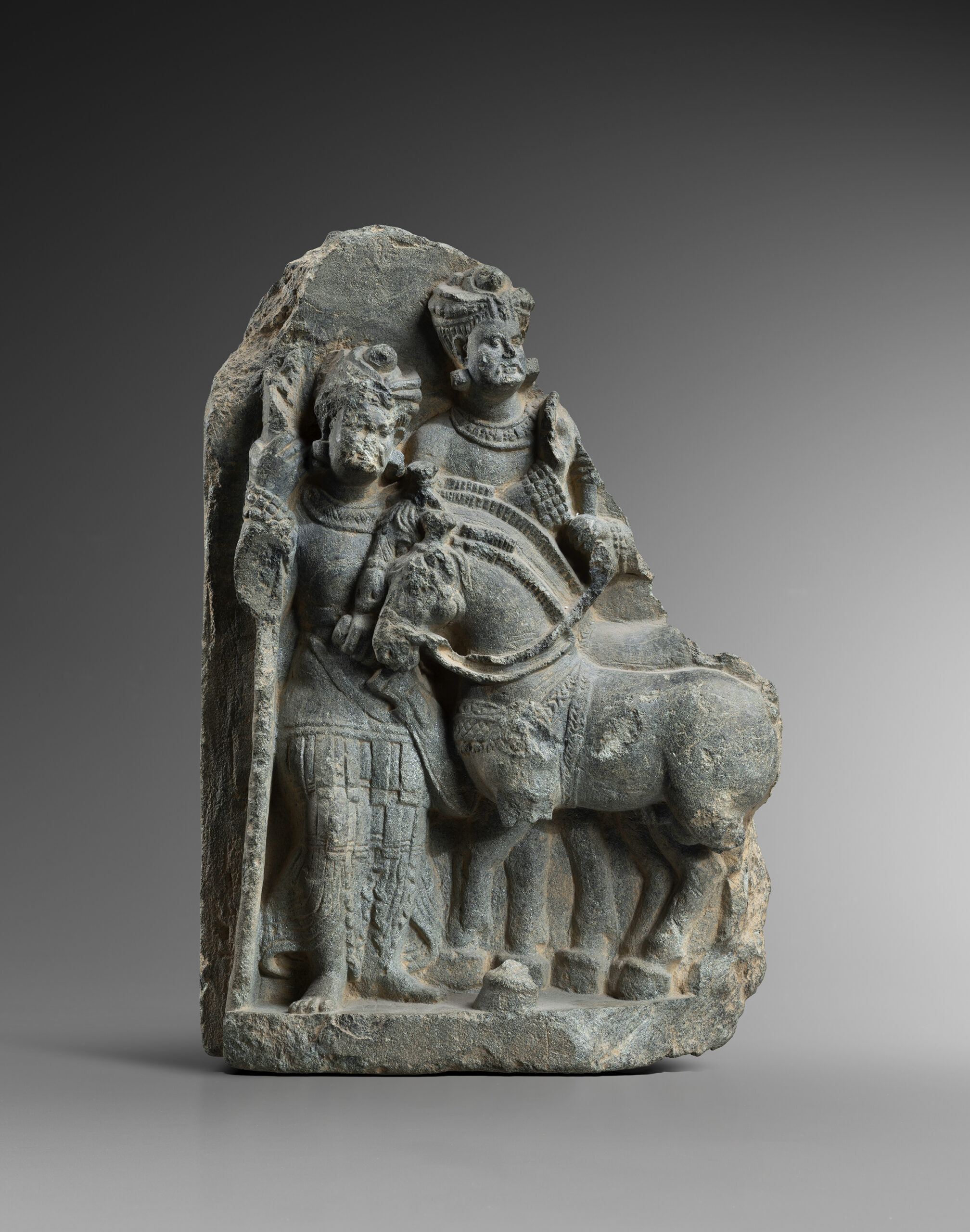 FRAGMENT OF A RELIEF DEPICTING TWO HORSES AND ATTENDANTS