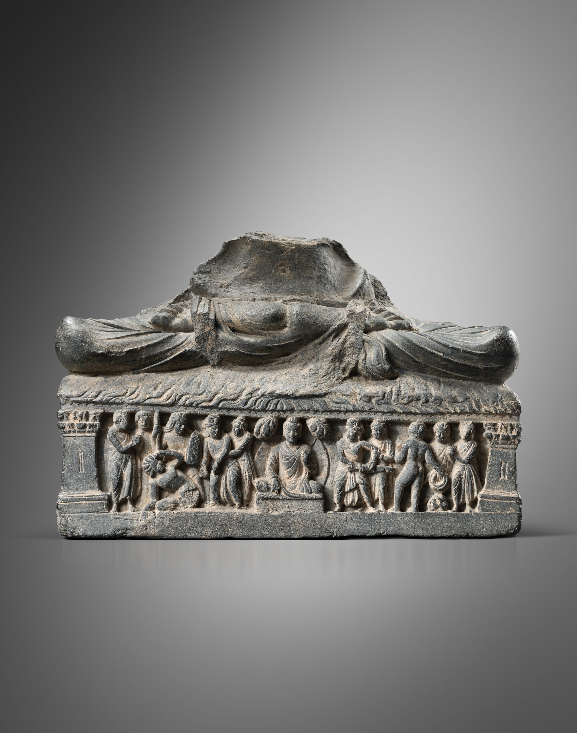 LOWER BASE OF A FASTING BUDDHA