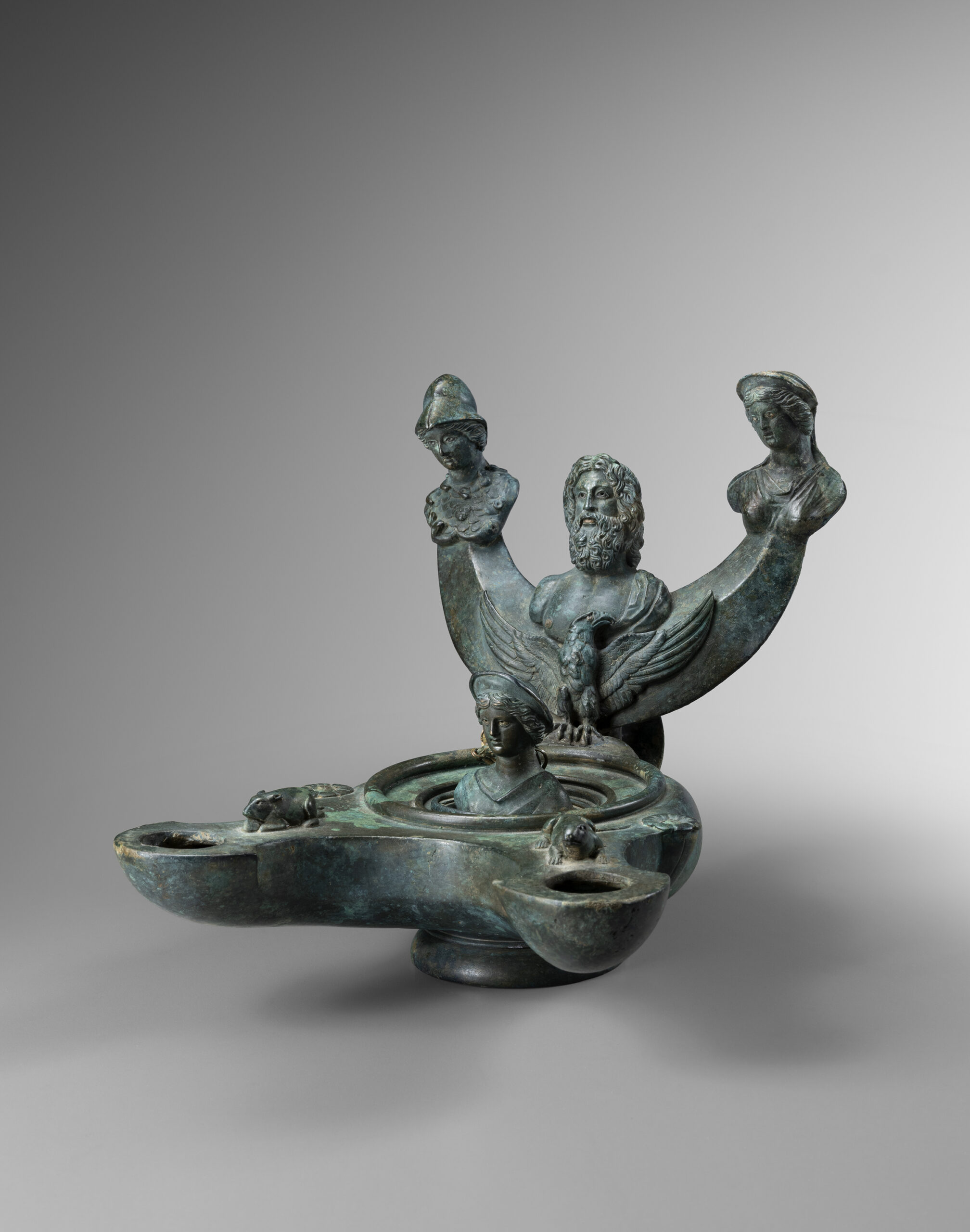 ROMAN IMPERIAL OIL LAMP WITH CAPITOLINE TRIAD AND VENUS