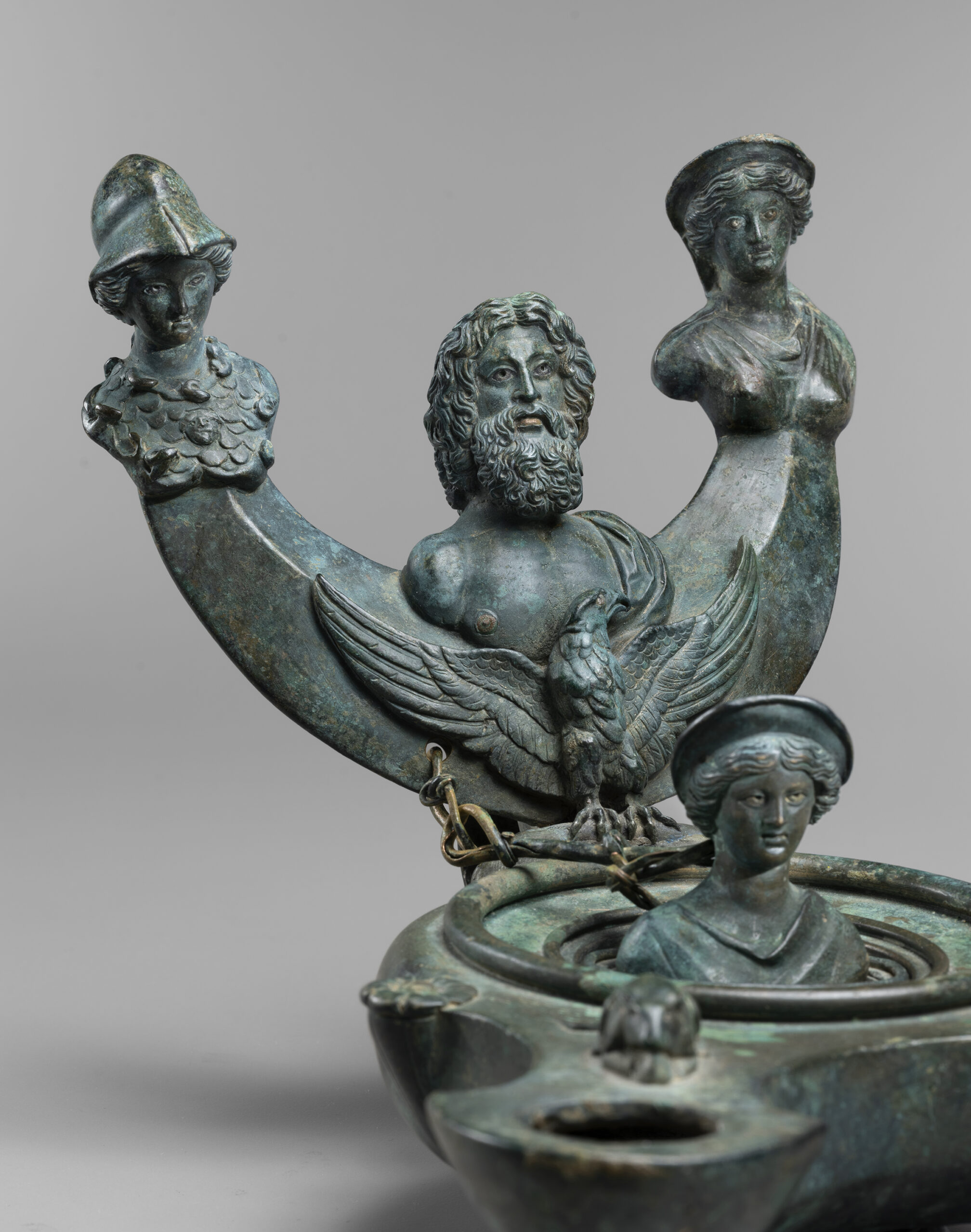 ROMAN IMPERIAL OIL LAMP WITH CAPITOLINE TRIAD AND VENUS